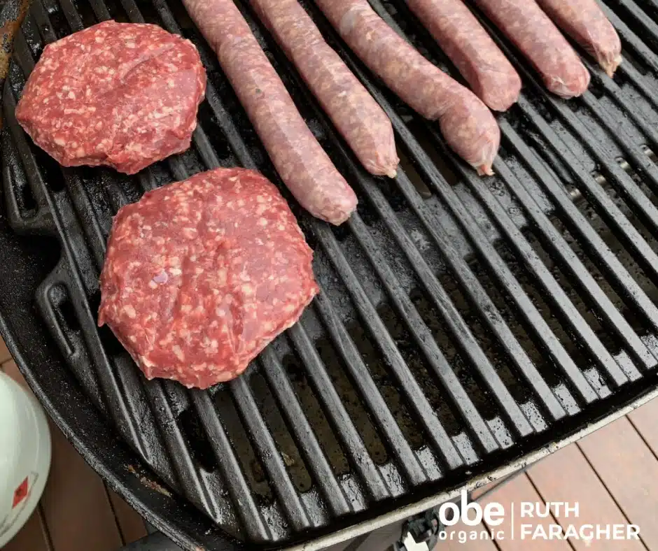 Burger Or Sausages in grill